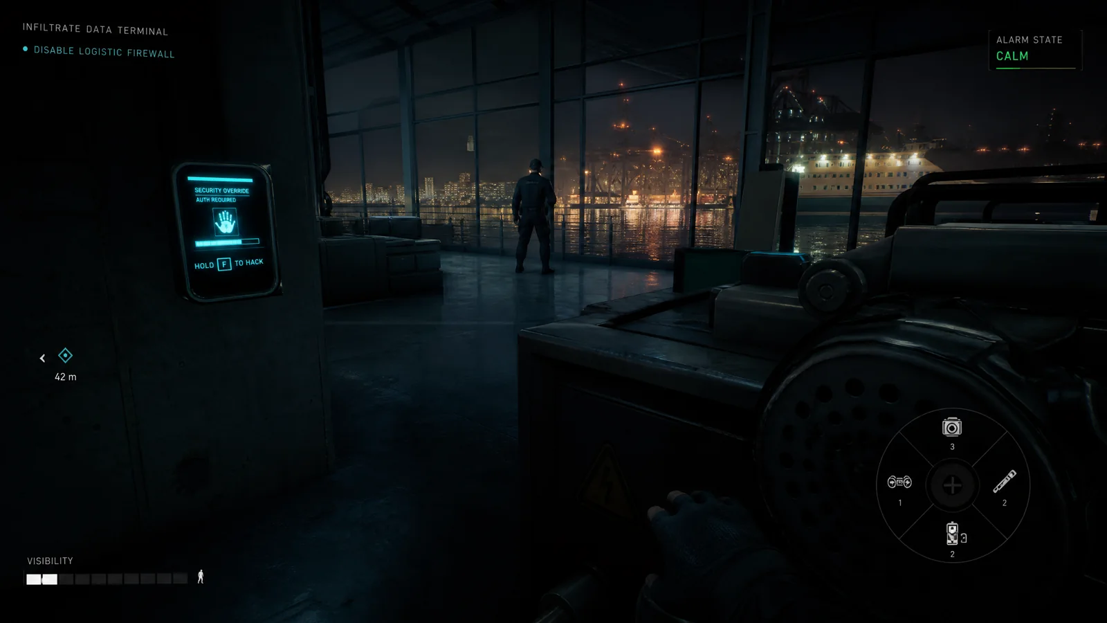 First-person stealth gameplay inside a waterfront data terminal with guard, hackable panel, visibility and alarm HUD.